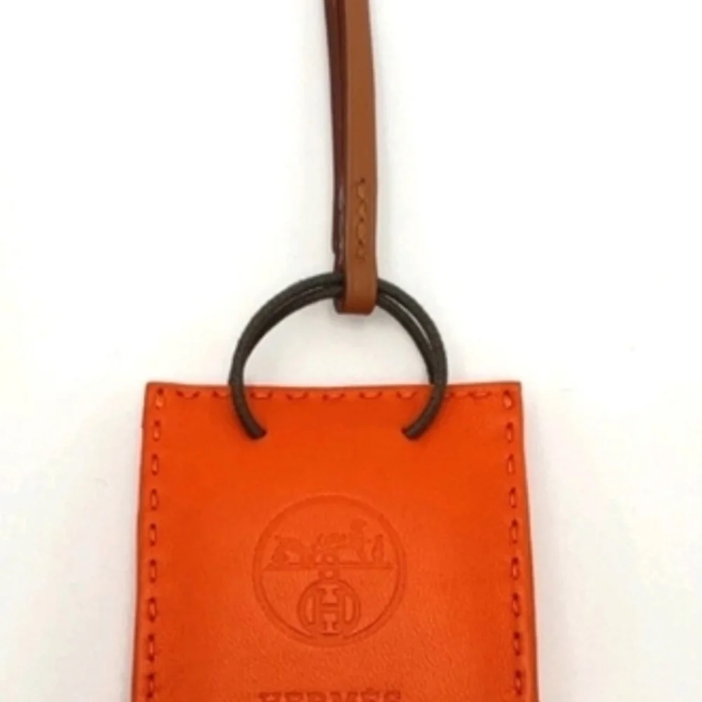 HERMÈS ORANGE LEATHER MINI POUCH BAG CHARM KEY HOLDER + BOX - Picture 6 of 12